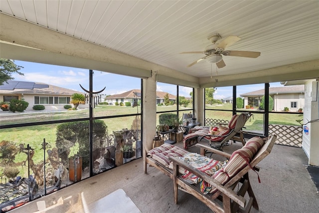 1633 Bentwood Dr, Sun City Center, FL 33573 - sunroom with ceiling fan, a residential view, and outdoor lounge area