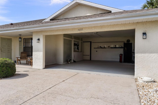 1633 Bentwood Dr, Sun City Center, FL 33573 - garage with concrete driveway