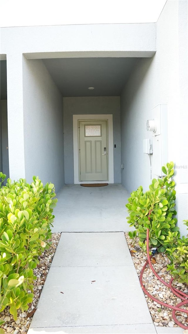 36439 Garden Wall Way, Zephyrhills, FL 33541 - entrance to property featuring stucco siding