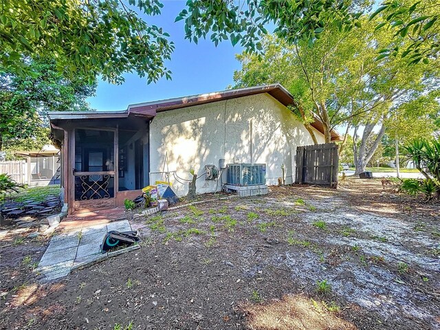 2031 Dover Ct, Oldsmar, FL 34677 - back of property with central AC