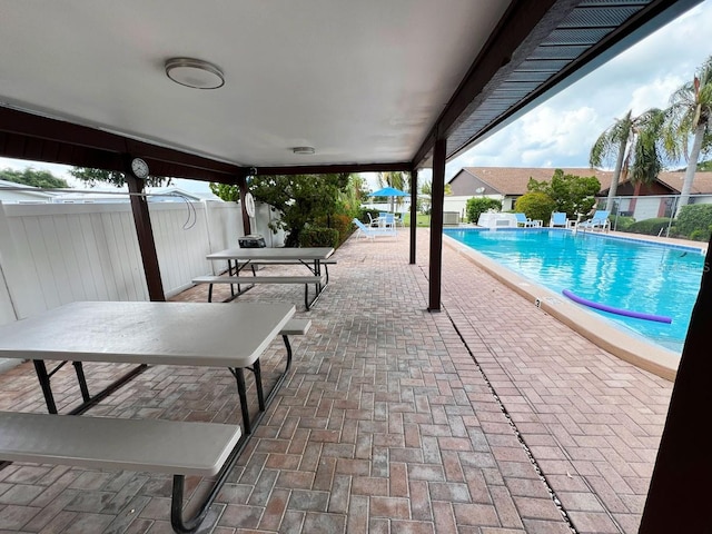 2031 Dover Ct, Oldsmar, FL 34677 - community pool with a patio area