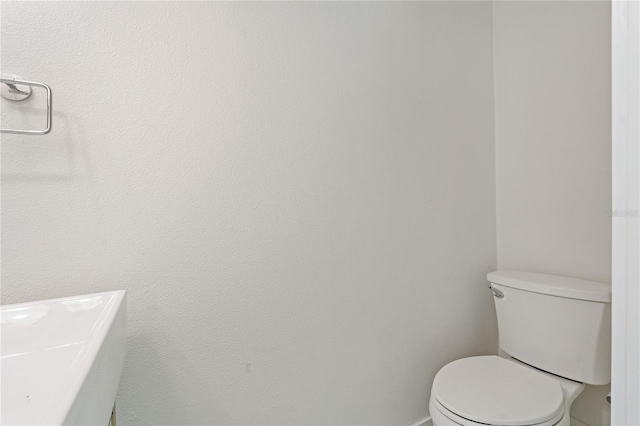 433 Pineapple St, Tarpon Springs, FL 34689 - bathroom featuring toilet
