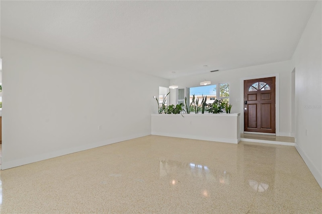 433 Pineapple St, Tarpon Springs, FL 34689 - entrance foyer with baseboards