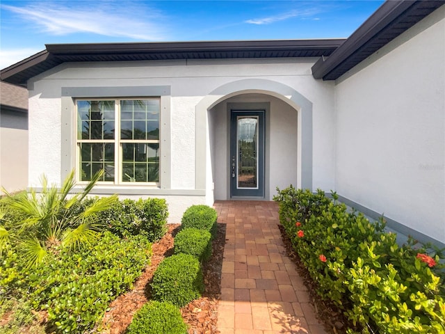 19664 Ship Wheel Way, Land O Lakes, FL 34638 - entrance to property featuring stucco siding