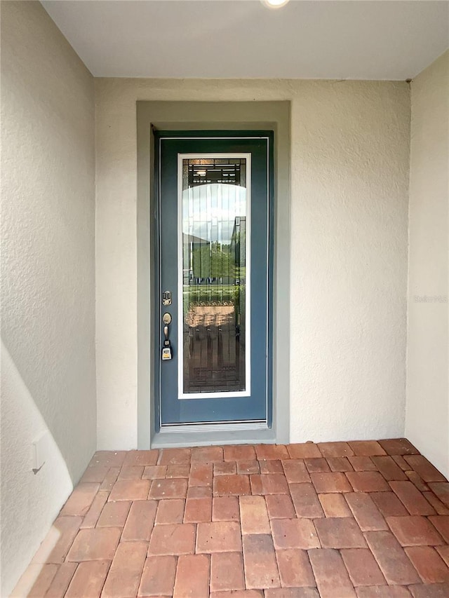 19664 Ship Wheel Way, Land O Lakes, FL 34638 - entrance to property with stucco siding