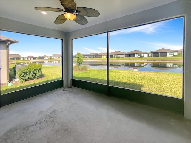 19664 Ship Wheel Way, Land O Lakes, FL 34638 - unfurnished sunroom with a water view, ceiling fan, and a residential view