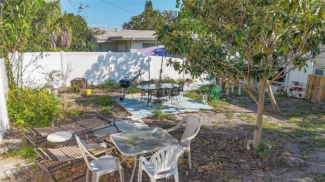2066 High Ridge Dr, Clearwater, FL 33763 - view of yard with outdoor dining space and a patio