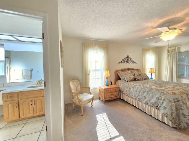 3509 Oak Lake Dr, Palm Harbor, FL 34684 - bedroom featuring a sink, a textured ceiling, and ceiling fan