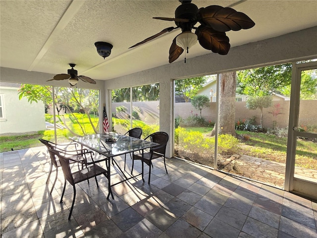 3509 Oak Lake Dr, Palm Harbor, FL 34684 - sunroom / solarium with ceiling fan and outdoor dining area