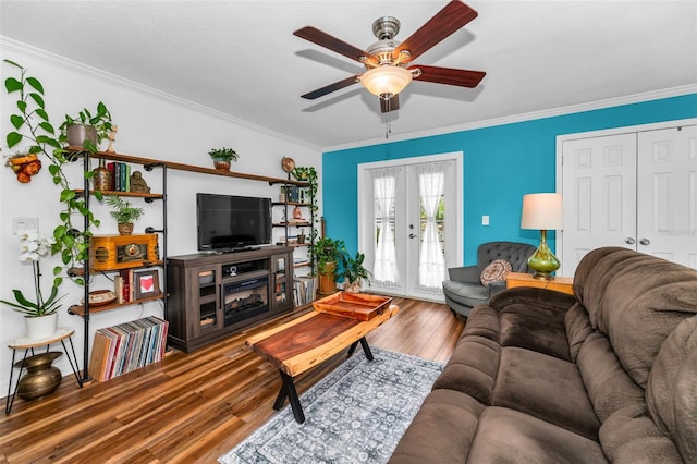 704 Lyndhurst St Unit 624, Dunedin, FL 34698 - living room featuring wood finished floors, ornamental molding, ceiling fan, and french doors