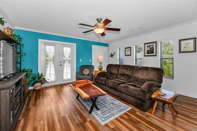704 Lyndhurst St Unit 624, Dunedin, FL 34698 - living area featuring hardwood / wood-style flooring, ceiling fan, baseboards, and crown molding