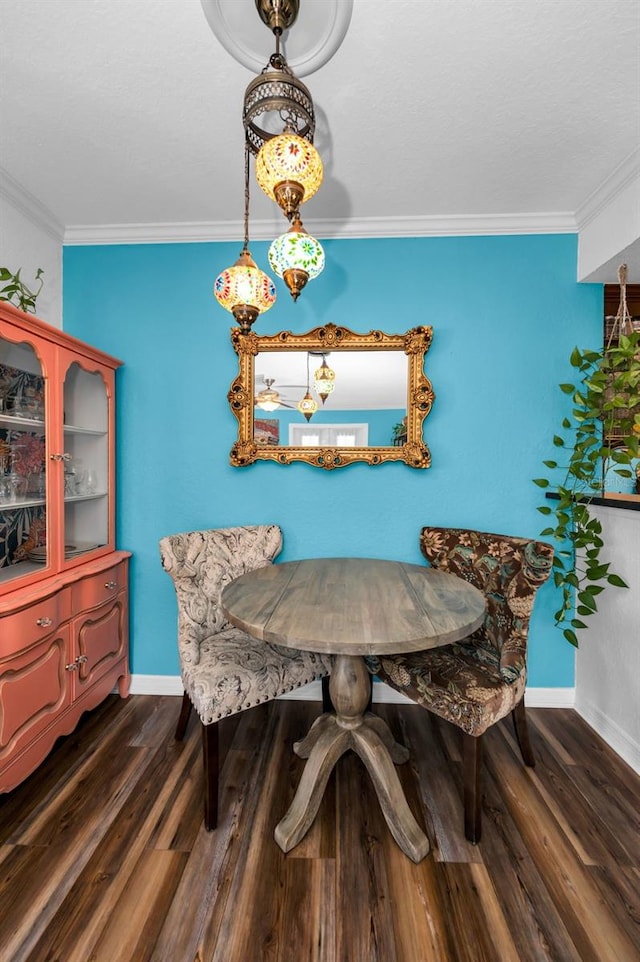 704 Lyndhurst St Unit 624, Dunedin, FL 34698 - dining room featuring ornamental molding, wood finished floors, and baseboards