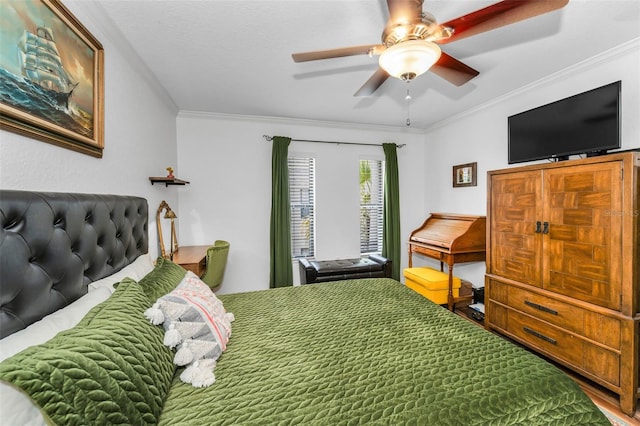 704 Lyndhurst St Unit 624, Dunedin, FL 34698 - bedroom featuring ornamental molding and a ceiling fan