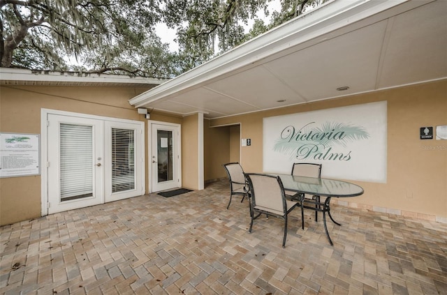 704 Lyndhurst St Unit 624, Dunedin, FL 34698 - view of patio / terrace featuring outdoor dining space