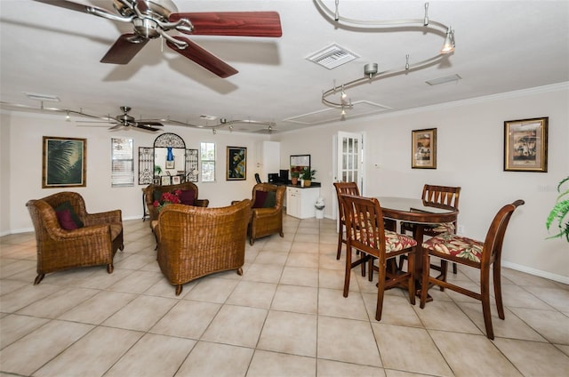 704 Lyndhurst St Unit 624, Dunedin, FL 34698 - living room featuring rail lighting, attic access, light tile patterned floors, ornamental molding, and a ceiling fan