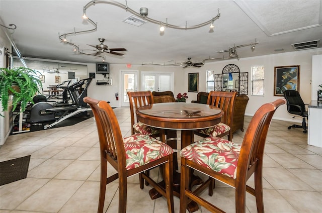 704 Lyndhurst St Unit 624, Dunedin, FL 34698 - dining space with ceiling fan, light tile patterned floors, and track lighting