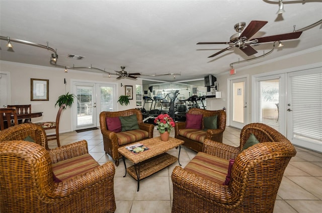 704 Lyndhurst St Unit 624, Dunedin, FL 34698 - living area featuring french doors, light tile patterned floors, a ceiling fan, crown molding, and rail lighting
