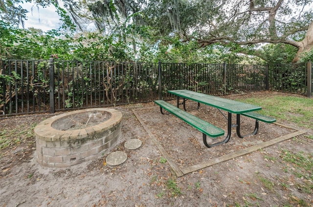 704 Lyndhurst St Unit 624, Dunedin, FL 34698 - view of patio / terrace featuring a fire pit