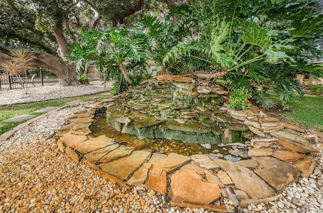704 Lyndhurst St Unit 624, Dunedin, FL 34698 - exterior view of a garden pond