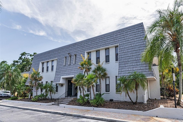 704 Lyndhurst St Unit 624, Dunedin, FL 34698 - view of front facade featuring mansard roof