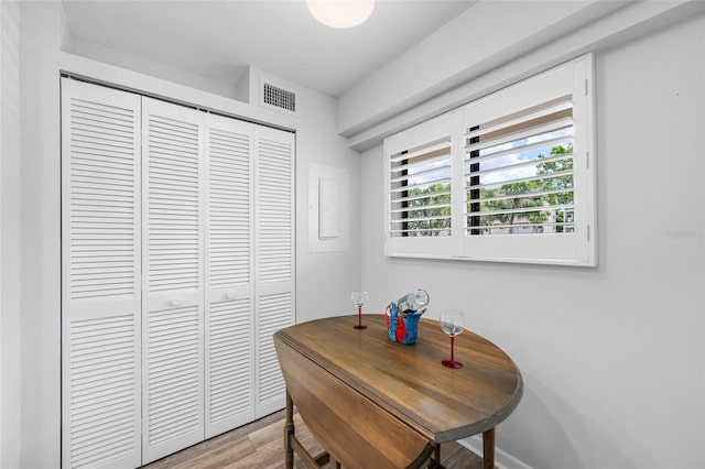 9450 Harbor Greens Way Unit 207, Seminole, FL 33776 - dining area featuring light wood-style floors