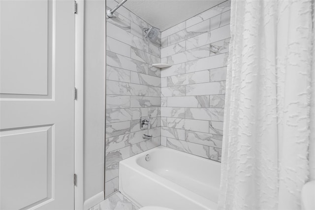 9450 Harbor Greens Way Unit 207, Seminole, FL 33776 - bathroom featuring marble finish flooring, shower / bath combo, baseboards, and toilet