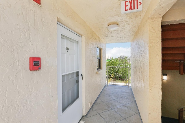 14401 Gulf Blvd Unit 106, Madeira Beach, FL 33708 - property entrance with stucco siding