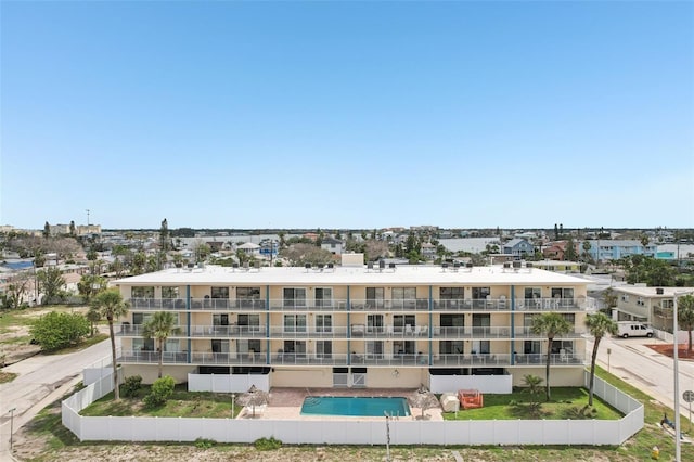 14401 Gulf Blvd Unit 106, Madeira Beach, FL 33708 - view of apartment building / complex featuring a community pool