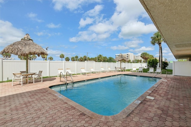 14401 Gulf Blvd Unit 106, Madeira Beach, FL 33708 - community pool featuring a patio