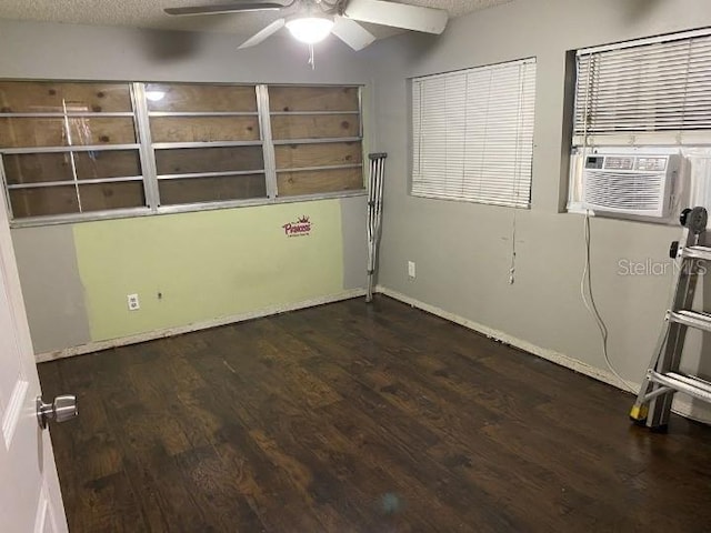 3512 16th St E, Bradenton, FL 34208 - empty room featuring ceiling fan, dark wood-style floors, baseboards, and cooling unit