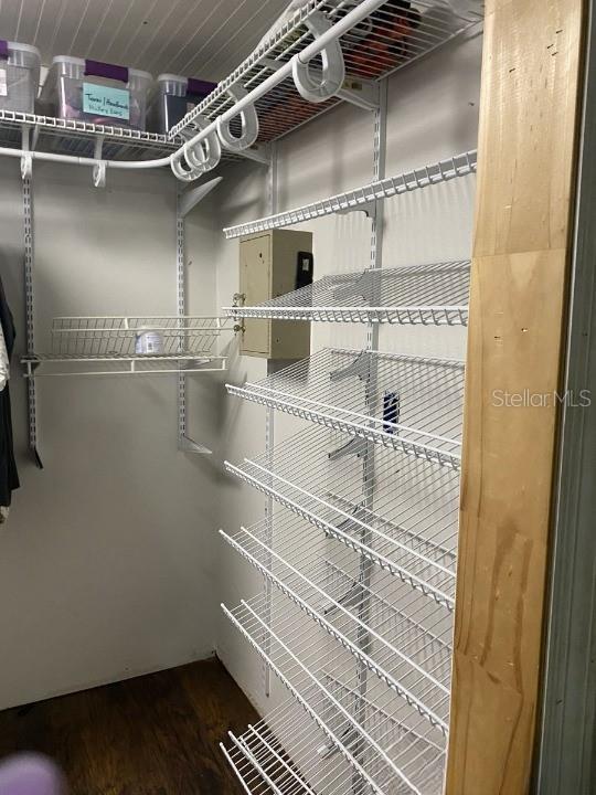 3512 16th St E, Bradenton, FL 34208 - walk in closet with wood finished floors