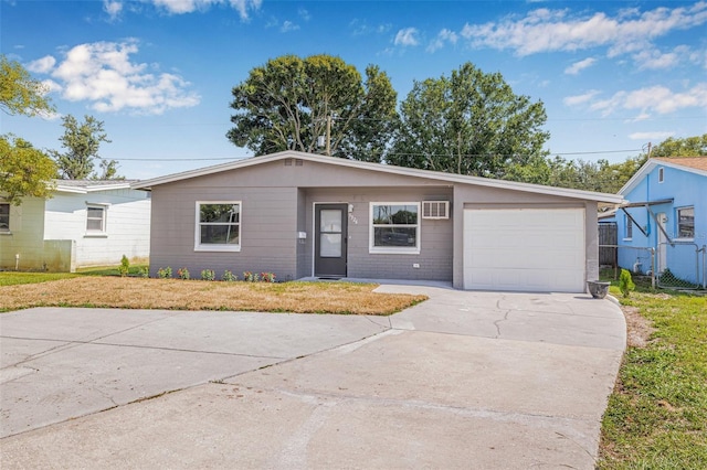 5326 22nd Ave N, Saint Petersburg, FL 33710 - view of front of home with an attached garage and concrete driveway