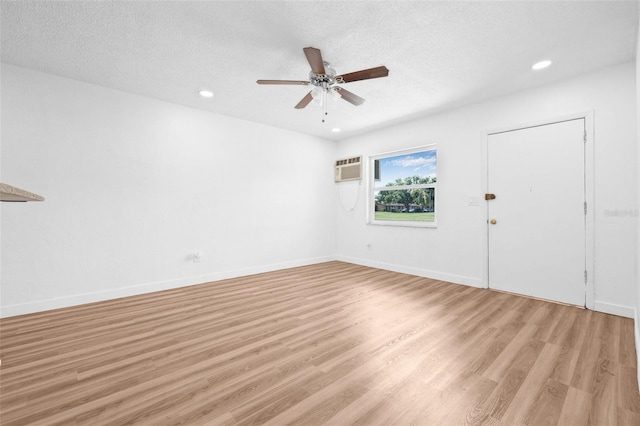 5326 22nd Ave N, Saint Petersburg, FL 33710 - unfurnished room featuring light wood-style flooring, ceiling fan, a textured ceiling, recessed lighting, and baseboards
