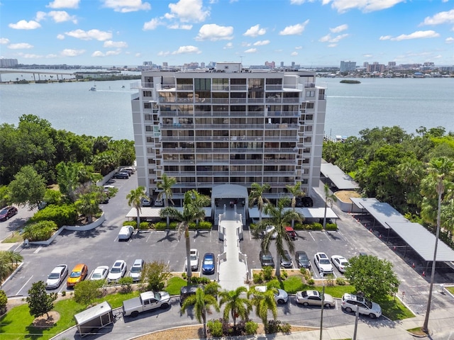 500 N Osceola Ave Unit 811, Clearwater, FL 33755 - view of apartment building / complex featuring a city view, a water view, and uncovered parking