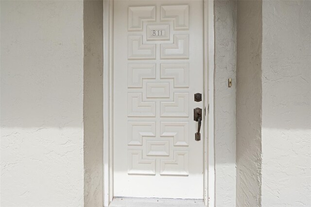 500 N Osceola Ave Unit 811, Clearwater, FL 33755 - property entrance featuring stucco siding