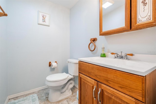 2700 Bayshore Blvd Unit 497, Dunedin, FL 34698 - half bath with baseboards, vanity, and toilet
