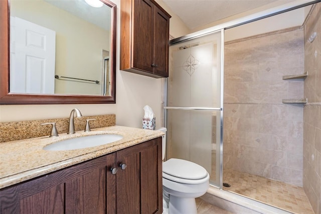 2700 Bayshore Blvd Unit 497, Dunedin, FL 34698 - full bathroom featuring a stall shower, toilet, and vanity