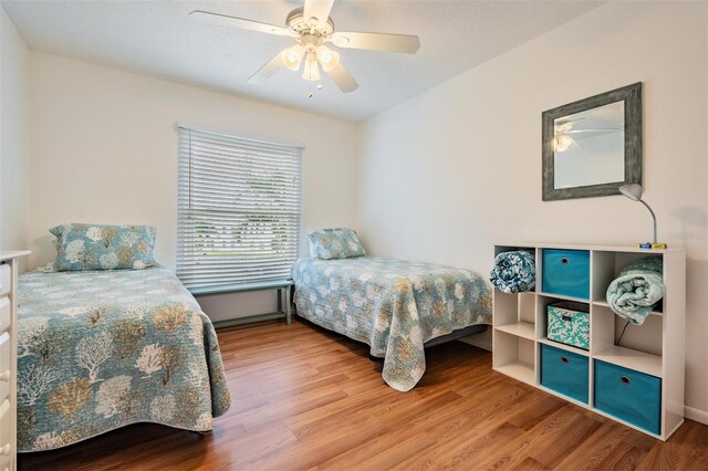 2700 Bayshore Blvd Unit 497, Dunedin, FL 34698 - bedroom featuring wood finished floors and a ceiling fan
