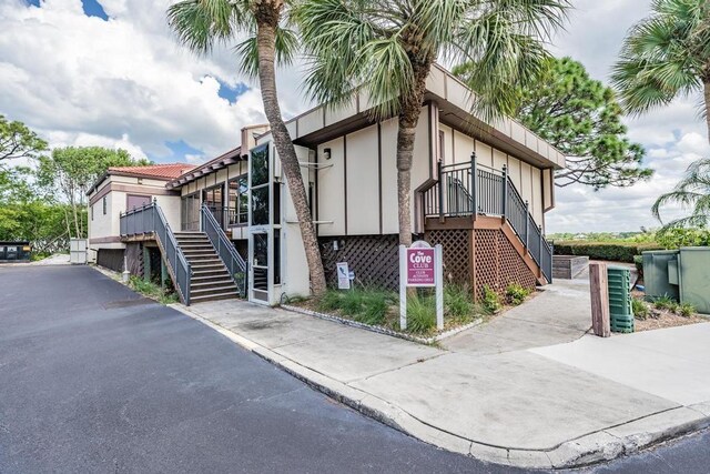2700 Bayshore Blvd Unit 497, Dunedin, FL 34698 - view of building exterior featuring stairway