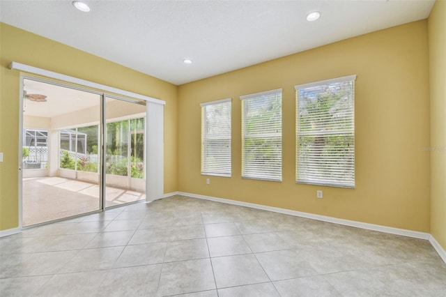 4089 Windcrest Dr, Wesley Chapel, FL 33544 - empty room with baseboards, light tile patterned floors, and recessed lighting