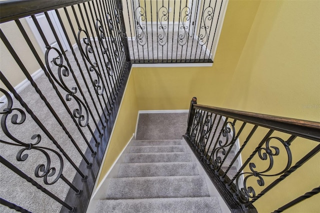 4089 Windcrest Dr, Wesley Chapel, FL 33544 - staircase with baseboards and carpet floors