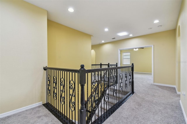 4089 Windcrest Dr, Wesley Chapel, FL 33544 - hallway featuring an upstairs landing, carpet, recessed lighting, and baseboards