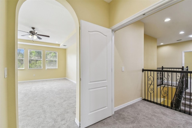 4089 Windcrest Dr, Wesley Chapel, FL 33544 - corridor with carpet flooring, an upstairs landing, recessed lighting, baseboards, and arched walkways
