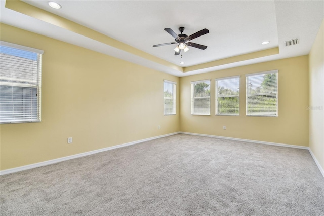 4089 Windcrest Dr, Wesley Chapel, FL 33544 - carpeted empty room with baseboards, a raised ceiling, ceiling fan, and recessed lighting