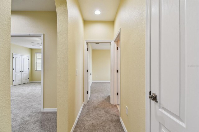 4089 Windcrest Dr, Wesley Chapel, FL 33544 - hall with carpet floors, a textured wall, and baseboards