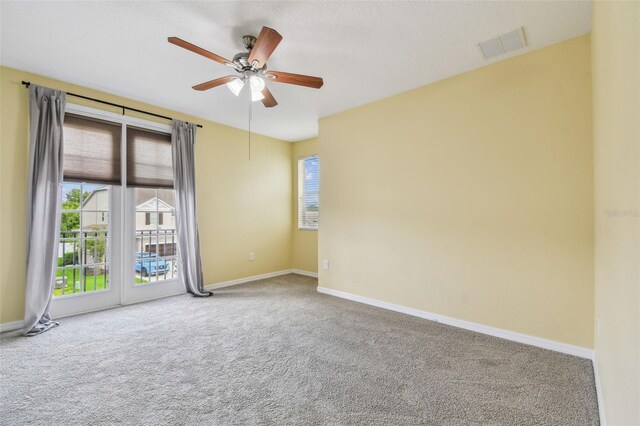 4089 Windcrest Dr, Wesley Chapel, FL 33544 - carpeted spare room featuring baseboards and a ceiling fan