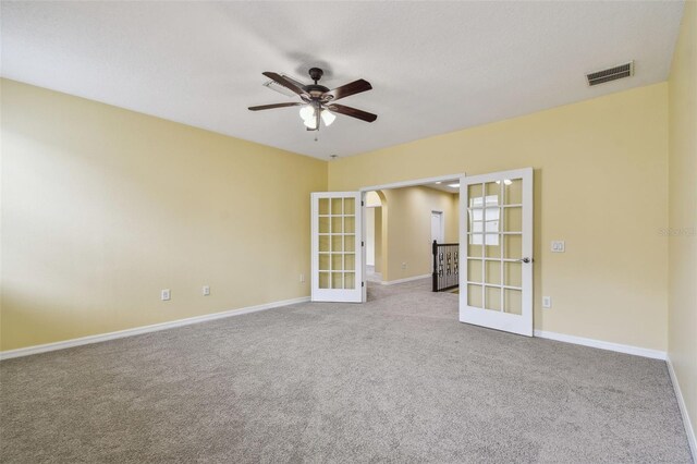 4089 Windcrest Dr, Wesley Chapel, FL 33544 - empty room with french doors, a ceiling fan, carpet, and baseboards