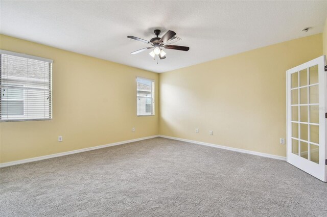 4089 Windcrest Dr, Wesley Chapel, FL 33544 - carpeted spare room with ceiling fan and baseboards