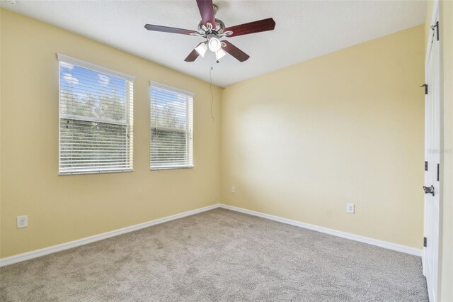 4089 Windcrest Dr, Wesley Chapel, FL 33544 - carpeted empty room with ceiling fan and baseboards