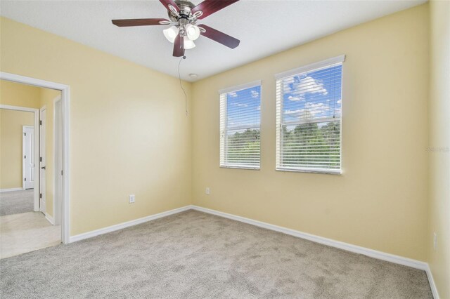 4089 Windcrest Dr, Wesley Chapel, FL 33544 - carpeted empty room with a ceiling fan and baseboards